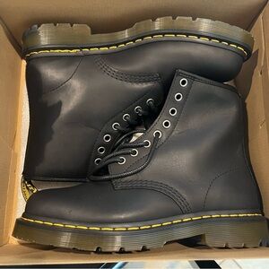 Dr Marten black boots. Men’s size 8, women’s size 9. New in box